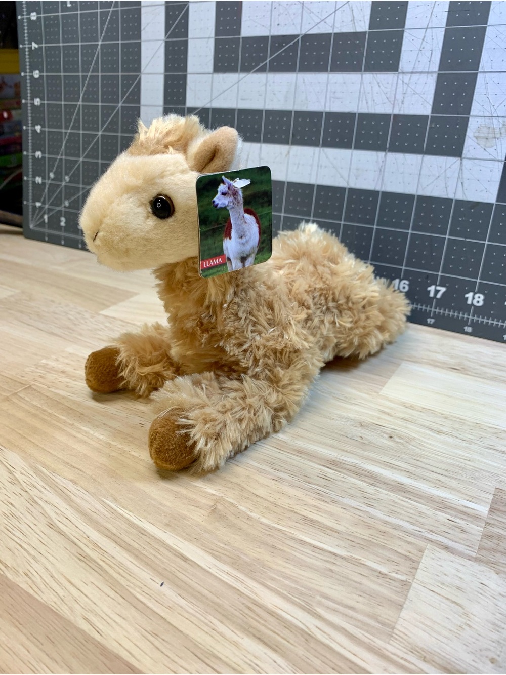 Small Tan Llama Plush Laying Down Semi Realistic Stuffed Animal